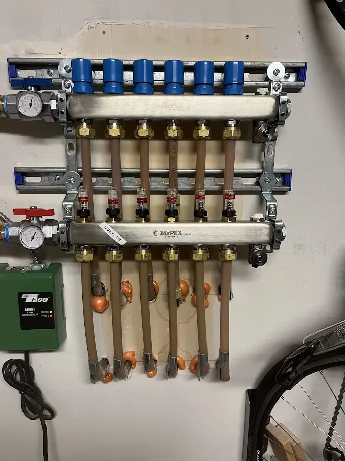 Plumber performing Water Heater Repair at a residential property in Grayslake